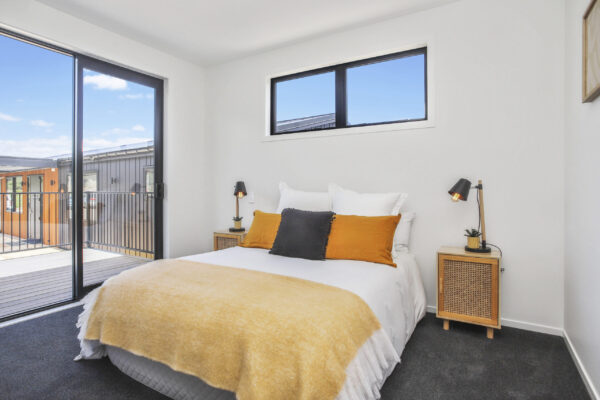003-ALT-scaled Interior bedroom view of an energy-efficient and environmentally friendly, transbuild transportable home