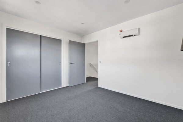 22_800px Bedroom view upstairs with wardrobe space in a developer series transbuild commercial home