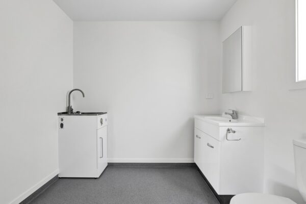 45_800px Laundry and bathroom space in a transportable transbuild home