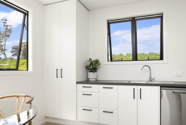 Kitchen section in a Transbuild Commercial Developer Series D76-B 2 bedroom home