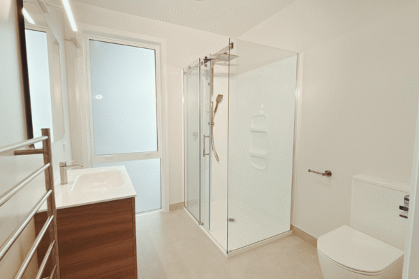 Beaumont 175 - Ensuite bathroom prefabricated home with modern bathroom by transbuild nz