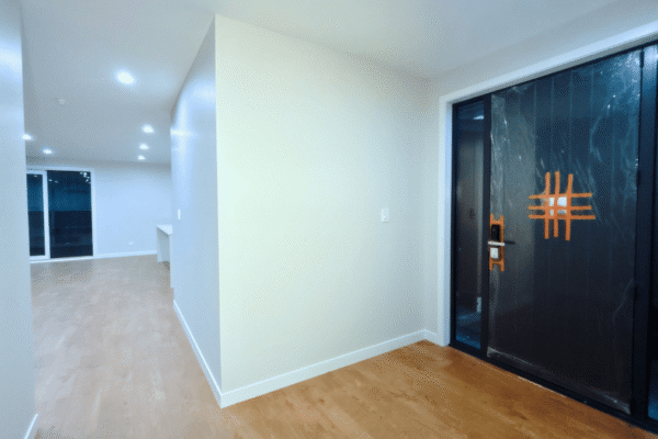 Beaumont 175 - Entrance Open Plan grand entrance to open plan space - architectural design prefab home nz by transbuild