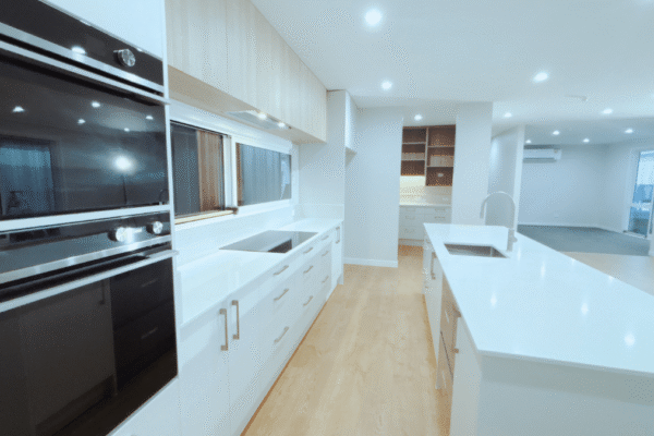 Beaumont 175 - Open plan living open plan kitchen and living high ceilings by transbuild nz