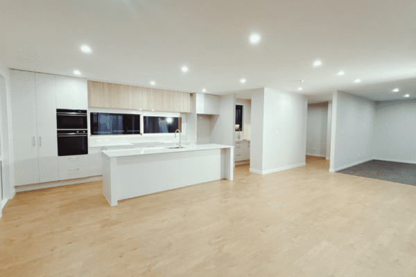Beaumont 175 - Open plan living with media room architectural design transportable prefab home with high ceilings by transbuild nz